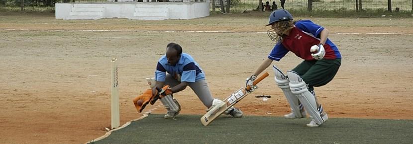 Playing cricket Playing cricket