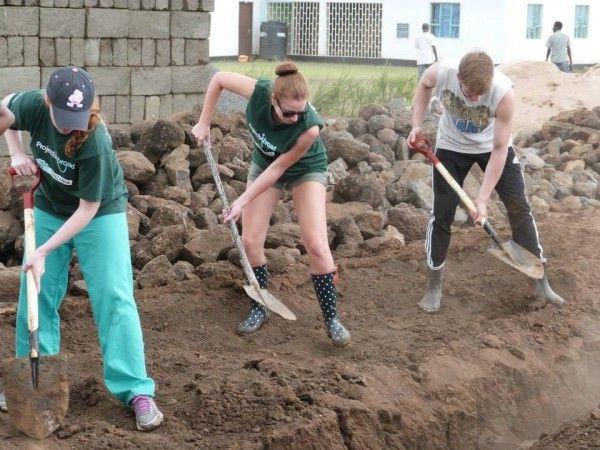 Projects Abroad volunteers work at the building site of the new Projects Abroad Academy for Maasai children. Projects Abroad volunteers work at the building site of the new Projects Abroad Academy for Maasai children