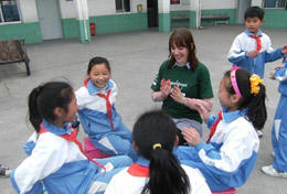 China A high school volunteer spends time with children in China during her Care Project.
