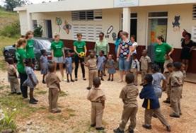 Jamaica Care & Community High School Special volunteers in Jamaica play a game with elementary school students.