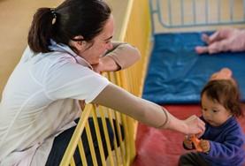 Internships for <br /> Social Work Students A volunteer based in Bolivia works with a child during a Social Work Internship for Students in Bolivia.