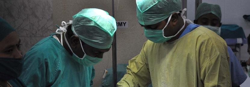 Local doctors conduct surgery while Medical School Elective students observe. Local doctors conduct surgery while Medical School Elective students observe.
