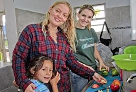 Medicine & Health Care Nutrition volunteers in Bolivia prepare delicious and healthy meals for children.