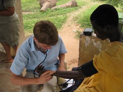 A Projects Abroad Public Health intern checks heart rates during an outreach in Ghana. A Projects Abroad Public Health intern checks heart rates during an outreach in Ghana.
