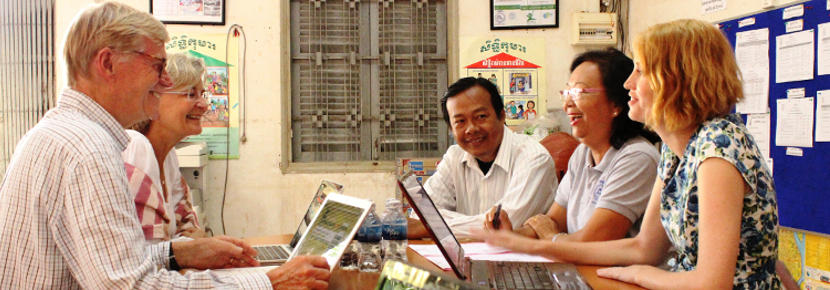 A group of Projects Abroad Microfinance interns discuss ways to assist entrepeneurs in Cambodia. A group of Projects Abroad Microfinance interns discuss ways to assist entrepeneurs in Cambodia.