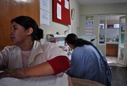 Peru A professional volunteer nurse with a local nurse at a hospital in Peru.